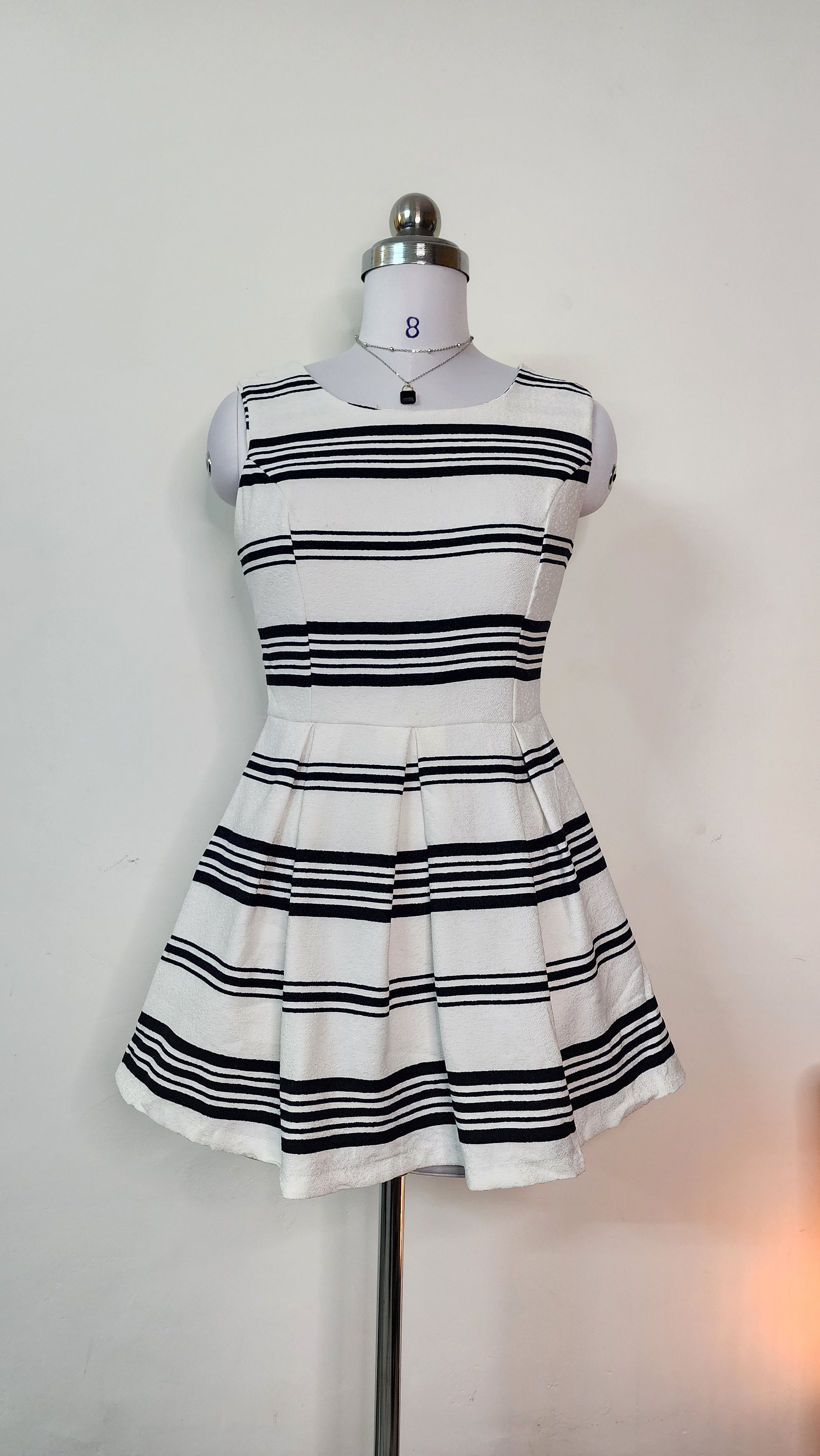 Chic Striped Sleeveless Mini Dress - Black and White Pleated A-Line