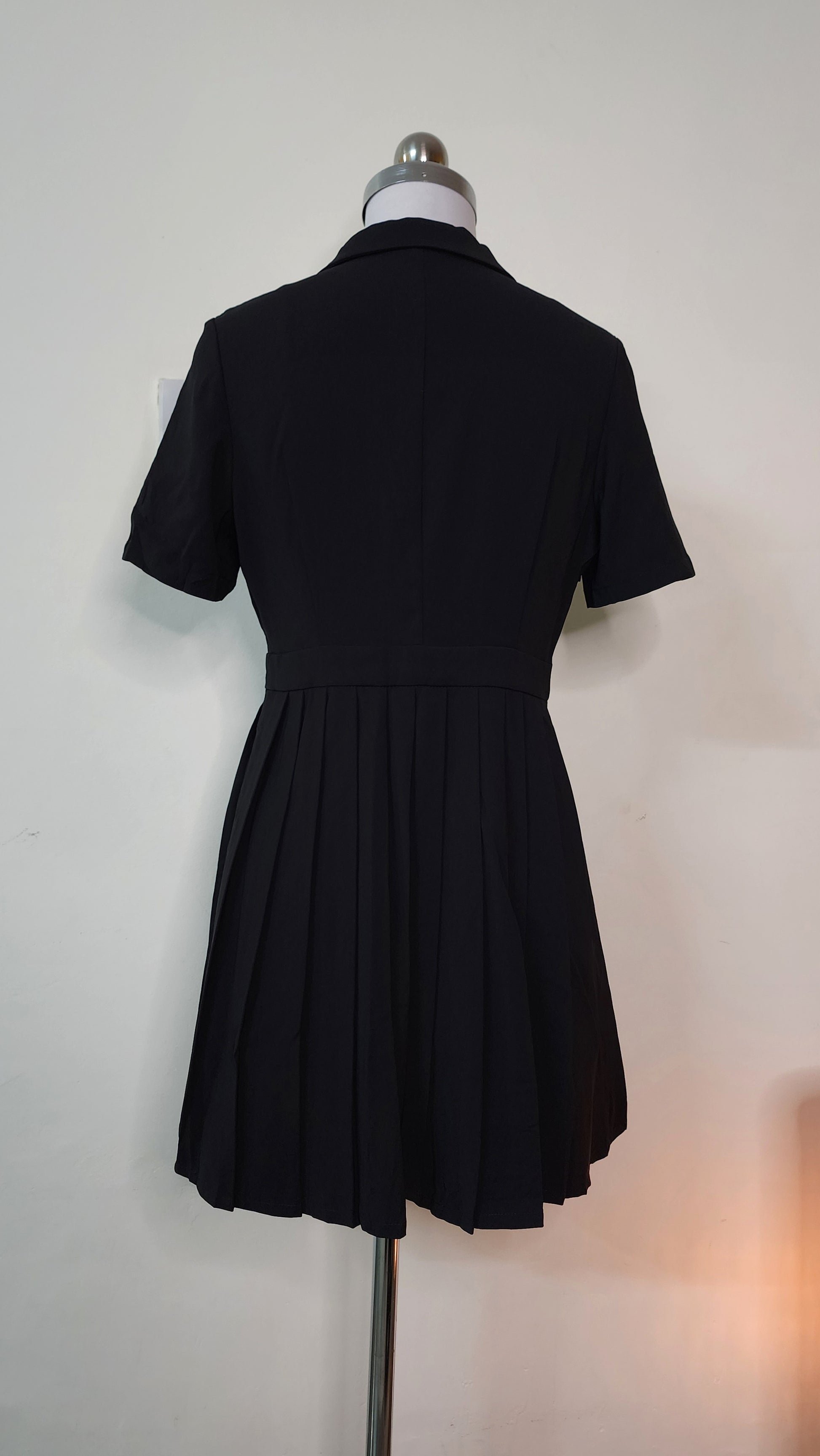 Classic Black Polo Mini Dress - Short Sleeve Pleated Skirt