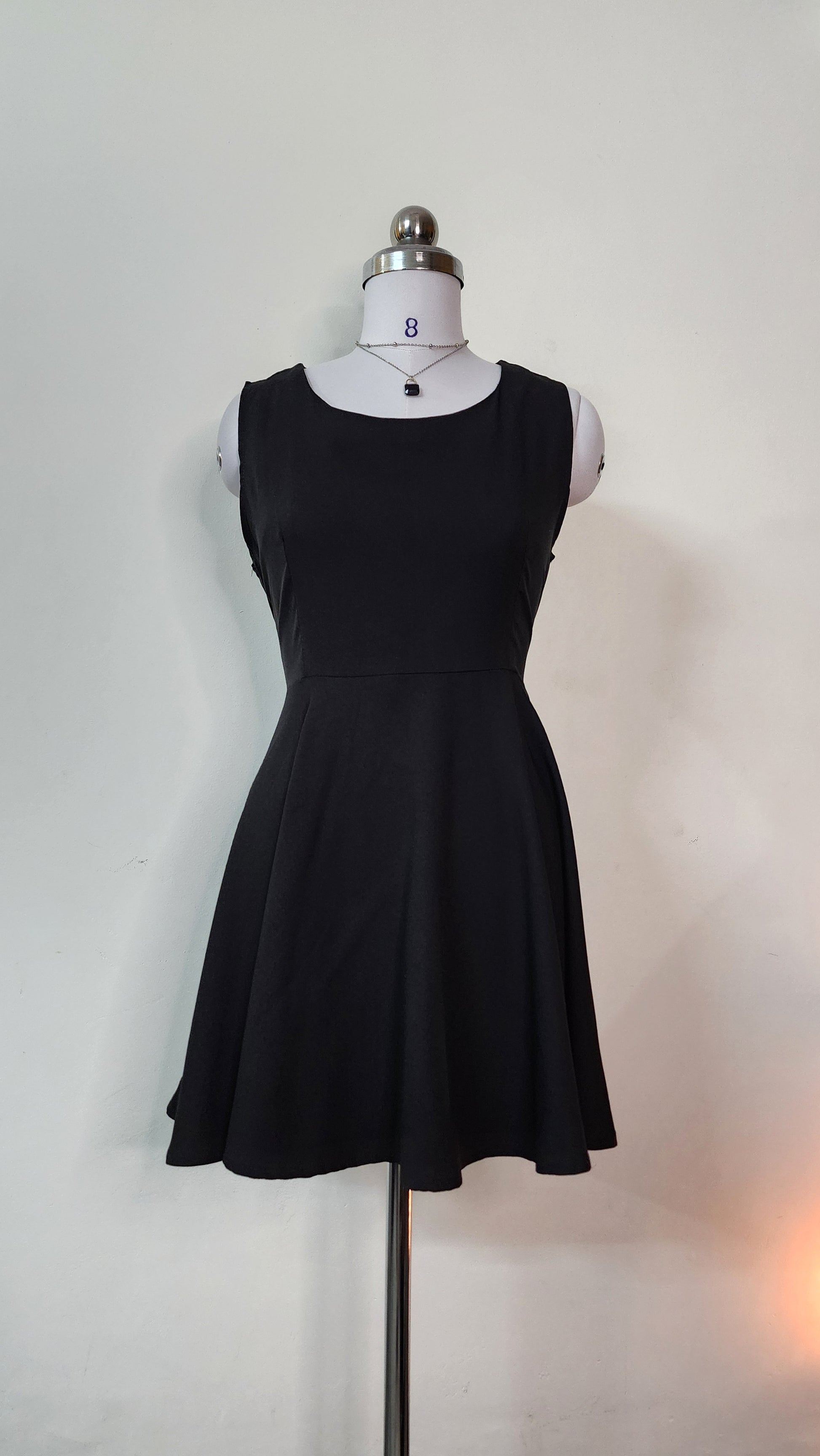 Classic Black Sleeveless Mini Dress - Round Neck A-Line Fit