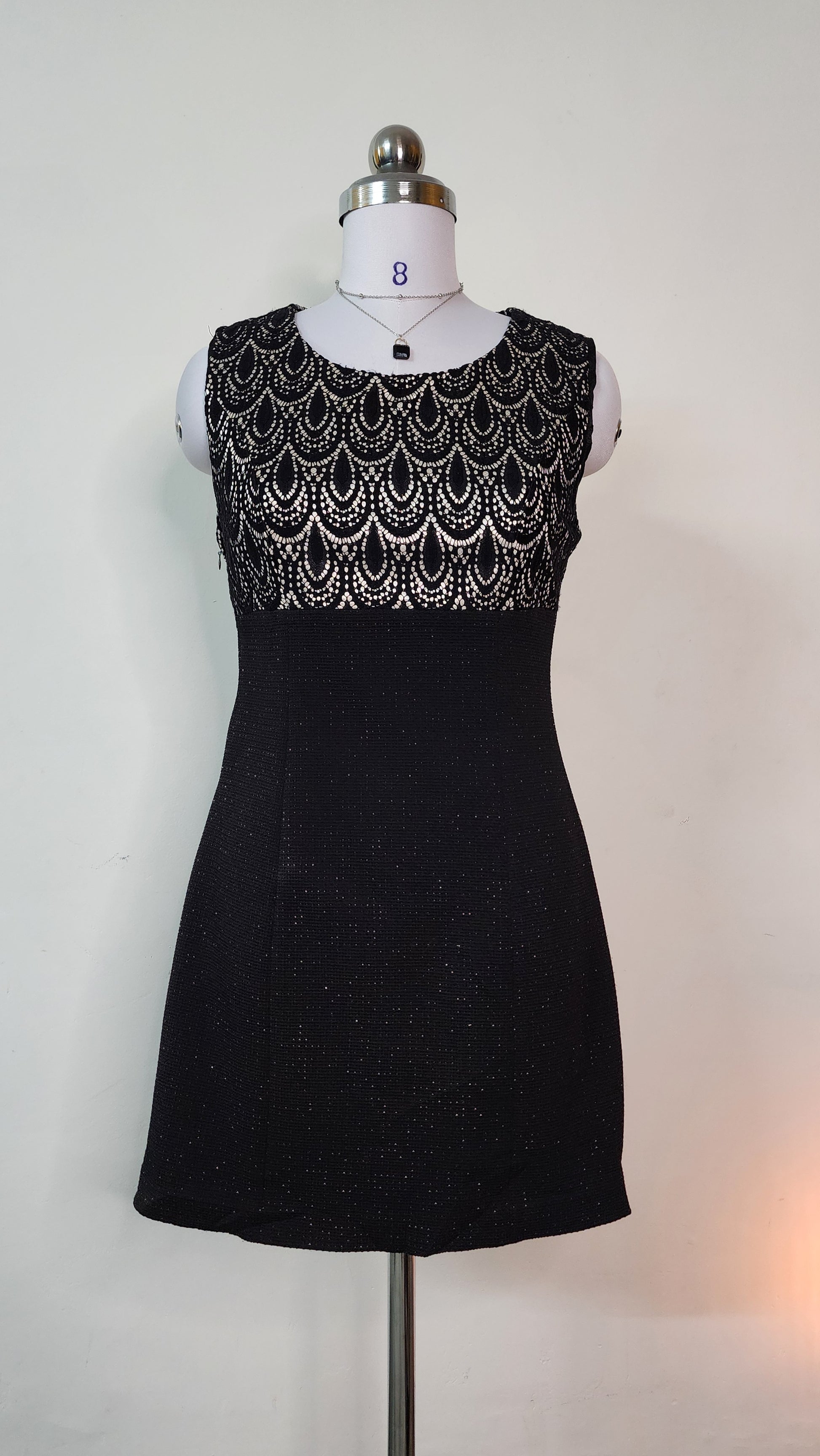 Elegant Black Sleeveless Mini Dress with Lace Bodice