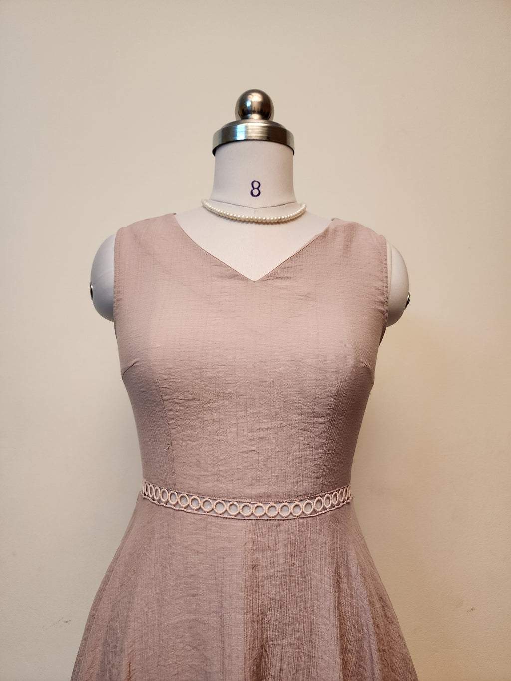 Elegant Blush Pink V-Neck Midi Dress with Textured Fabric