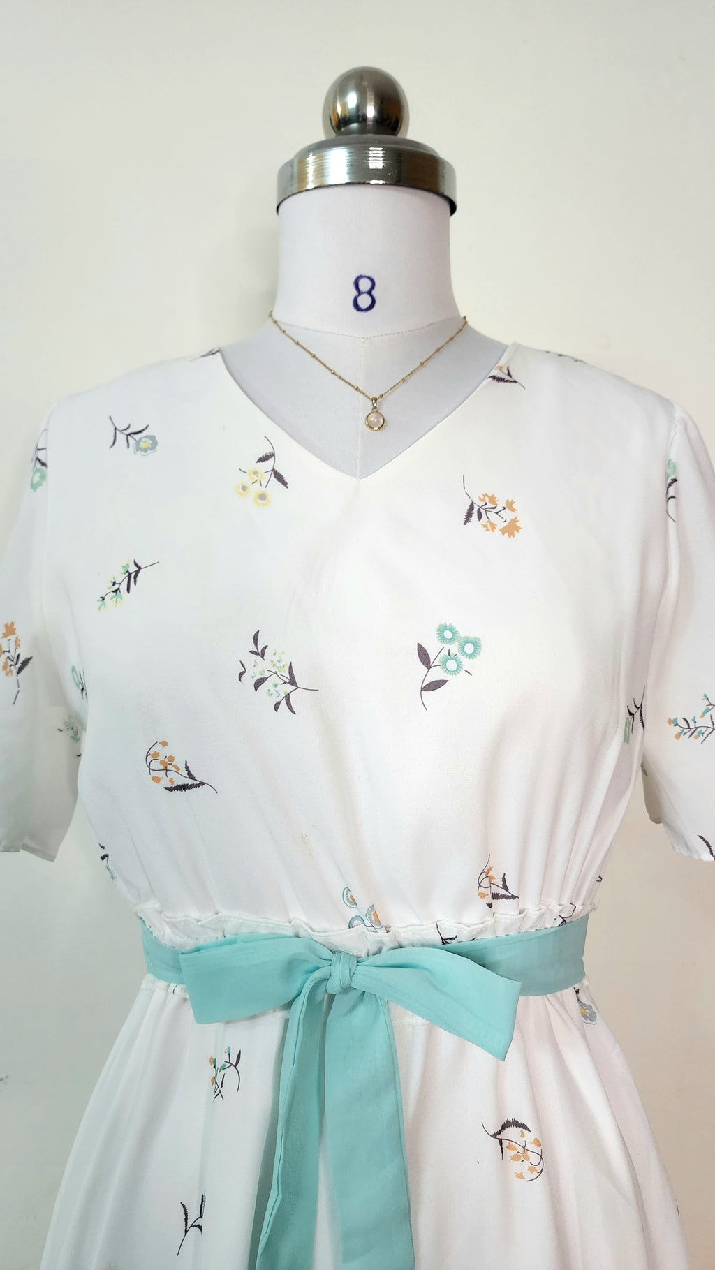 White Floral Print V-Neck Midi Dress with Blue Tie Belt