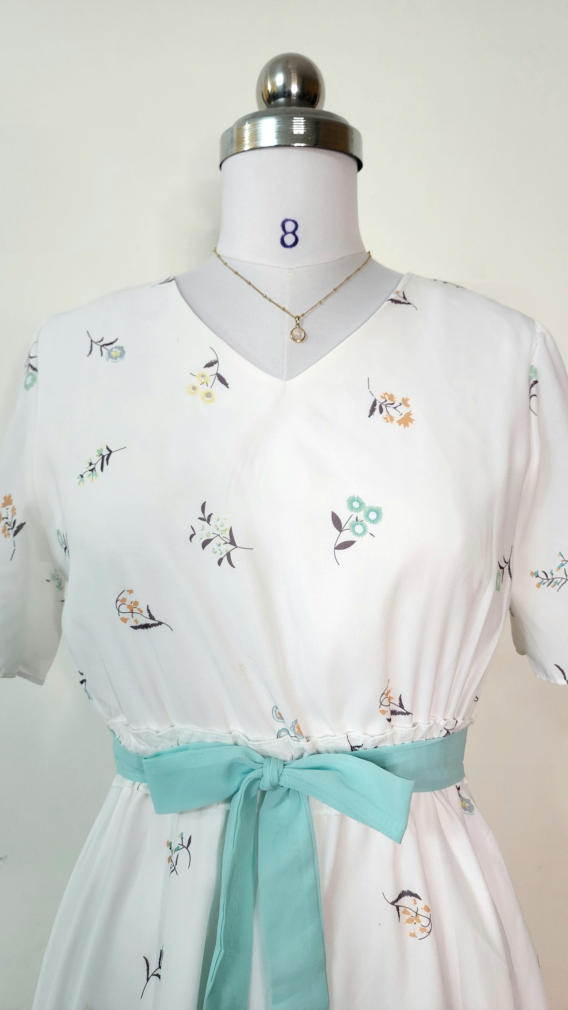 White Floral Print V-Neck Midi Dress with Blue Tie Belt